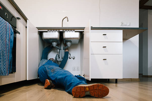 Professional Drain Cleaning technician working in Huston, ID